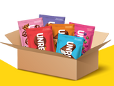 Box containing assorted colorful UNREAL snack packages