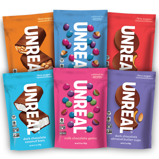 Six UNREAL candy packages in various flavors and colors, including peanut butter cups and milk chocolate gems.