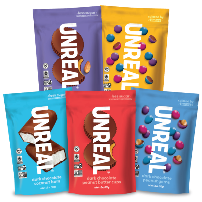 Five Unreal chocolate bars in various flavors and colorful packaging arranged in a group.