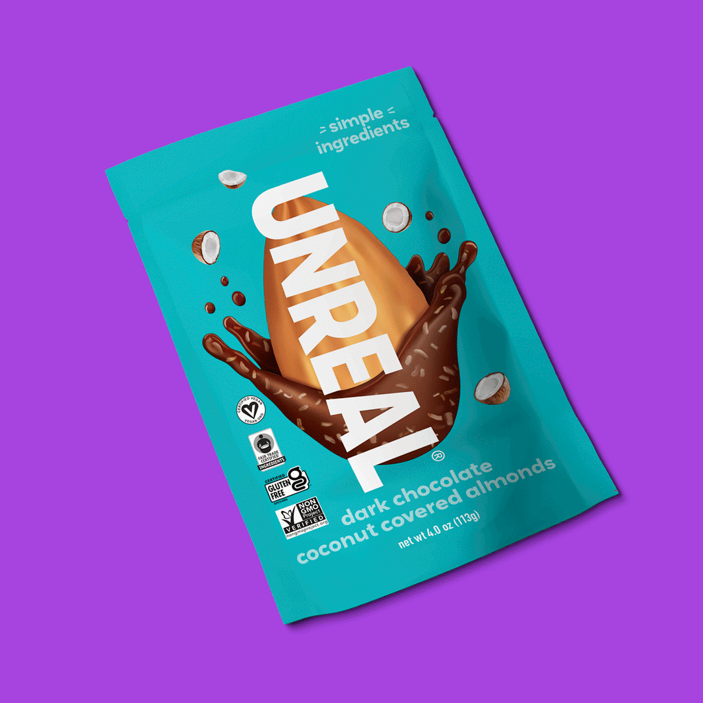 UNREAL dark chocolate coconut covered almonds package with simple ingredients, vegan, fair trade, gluten free, non GMO logos